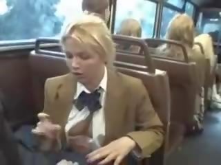 Blonde femme fatale suck asian lads phallus on the bus